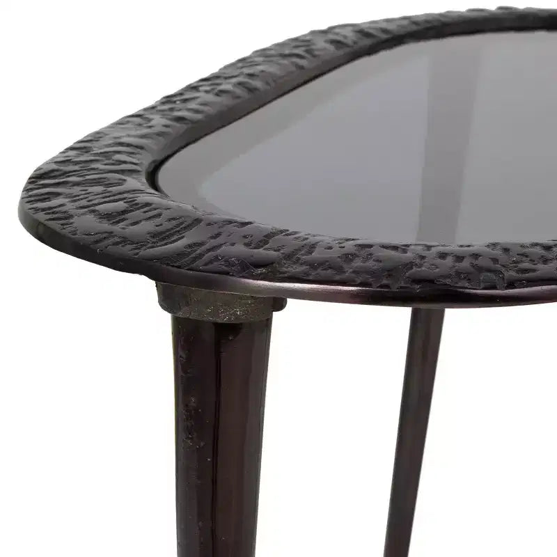 Tavolino ovale con base in alluminio e piano in vetro